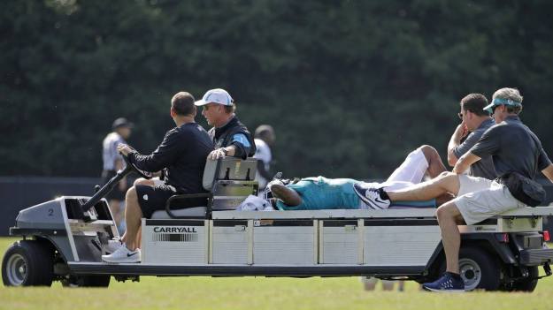 SPARTANBURG, SOUTH CAROLINA The Dolphins lost a starter Wednesday. Louis Delmas lost more than a million dollars. The question going forward: Has Delmas’ career been lost as well? For the second time in less than a year, Delmas sustained what appeared to be a catastrophic injury to his right knee. Some nine months after tearing his right anterior cruciate ligament, Delmas has done so again, initial tests have revealed. If the prognosis is correct, Delmas will be lost for the season and would have the longest of roads back to football. Teams were already wary of Delmas’ injury history; this offseason, he signed a contract with language that voided all but $400,000 of his $1.5 million contract if he sustained a season-ending injury in the preseason. He also obviously will not receive any of the playing-time incentive bonuses that were written into his deal. But after two ACL tears in as many seasons, Delmas, 28, would be fortunate to ever play again, industry insiders say. “He’s a great teammate, a great guy,” fellow Dolphins safety Reshad Jones said. “It’s bigger than football. I just went to make sure his mind is right and say a prayer for him.” Delmas went to the ground untouched during one-on-one drills Wednesday during the first of two joint practices with the Carolina Panthers. Delmas collapsed in obvious pain while covering former Dolphins receiver Ted Ginn Jr., grabbing his right knee. He needed to be carted off the field. Delmas is undergoing an MRI exam to confirm the severity. Dolphins coach Joe Philbin would not get into specifics when he met with reporters coming off the field. “I haven’t really had a chance, obviously, since practice has wrapped up,” Philbin said. “Obviously, we’ll check on him and hope for the best.”