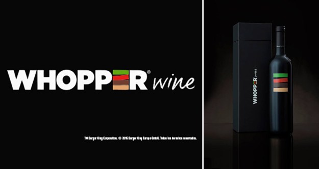 Burger King has been going to great lengths for attention. After calling out McDonald's for a Whopper-Big Mac mash-up and putting patties on tomato buns, the fast-food brand has become a little ludicrous with its new ideas. And its latest does not disappoint. Introducing Whopper Wine, a Spanish vino that's been aged in flame-grilled wooden barrels and supposedly pairs perfectly with the chain's hallmark burger. It might sound outlandish to us but this is actually a nod to Burger King's roots in Spain. After opening its first location in the country back in 1975, the brand immediately added wine to its menu to appeal to locals. Now, to celebrate its 40th anniversary in Spain, Burger King crafted its own red wine to honor its tagline that "fire is what we do best." The bottles have been designed with the minimalist green, red, brown, and tan stripes emblazoned on the chain's paper take-out bags. And the wine on the inside them has been aging in wooden barrels that were first grilled over a flame, infusing a charred flavor that apparently complements the Whopper and "enhances its flavor."